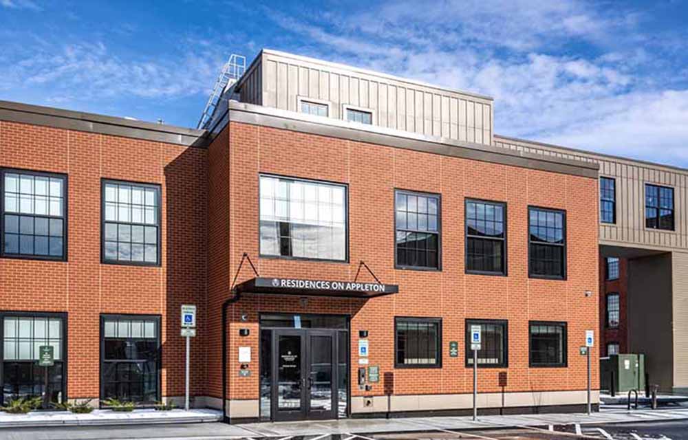 WinnCompanies opens 88-unit senior housing community after adaptive reuse of historic mill complex in Holyoke, MA